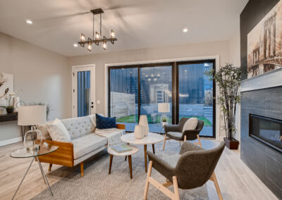 a Living Room with a sofa and two chairs