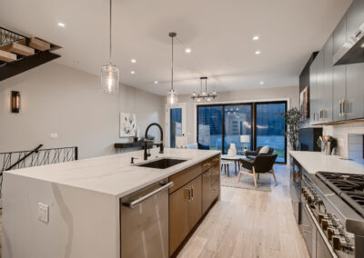 a kitchen area with an island and a countertop