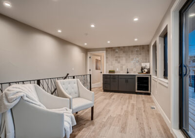 3rd Floor Recreation Room with two white chairs