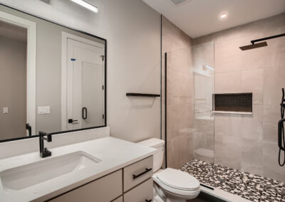 Lower Level Bathroom with commode and shower